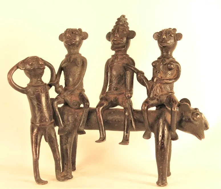 A king and two ladies on a two-headed beast