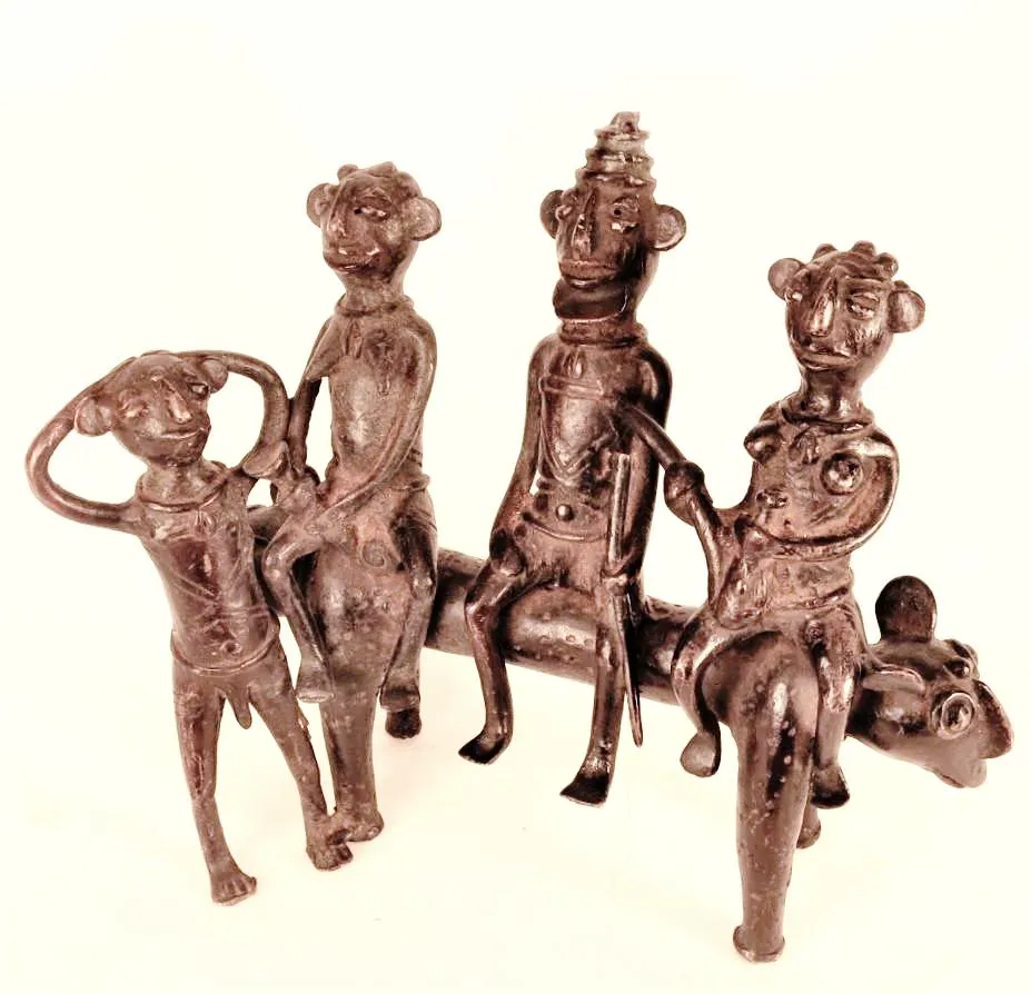 A king and two ladies on a two-headed beast